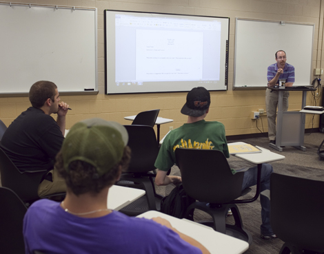 Dave Reilly speaks to class